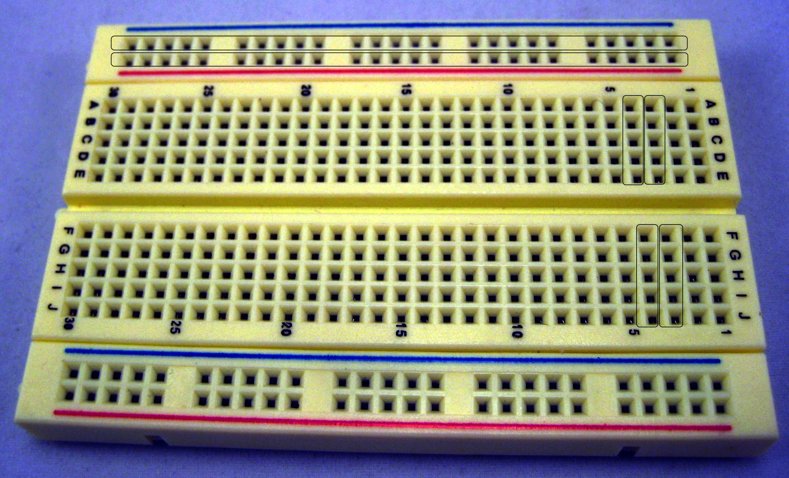 Figure 5: Use a breadboard to make temporary connections between electronics components.