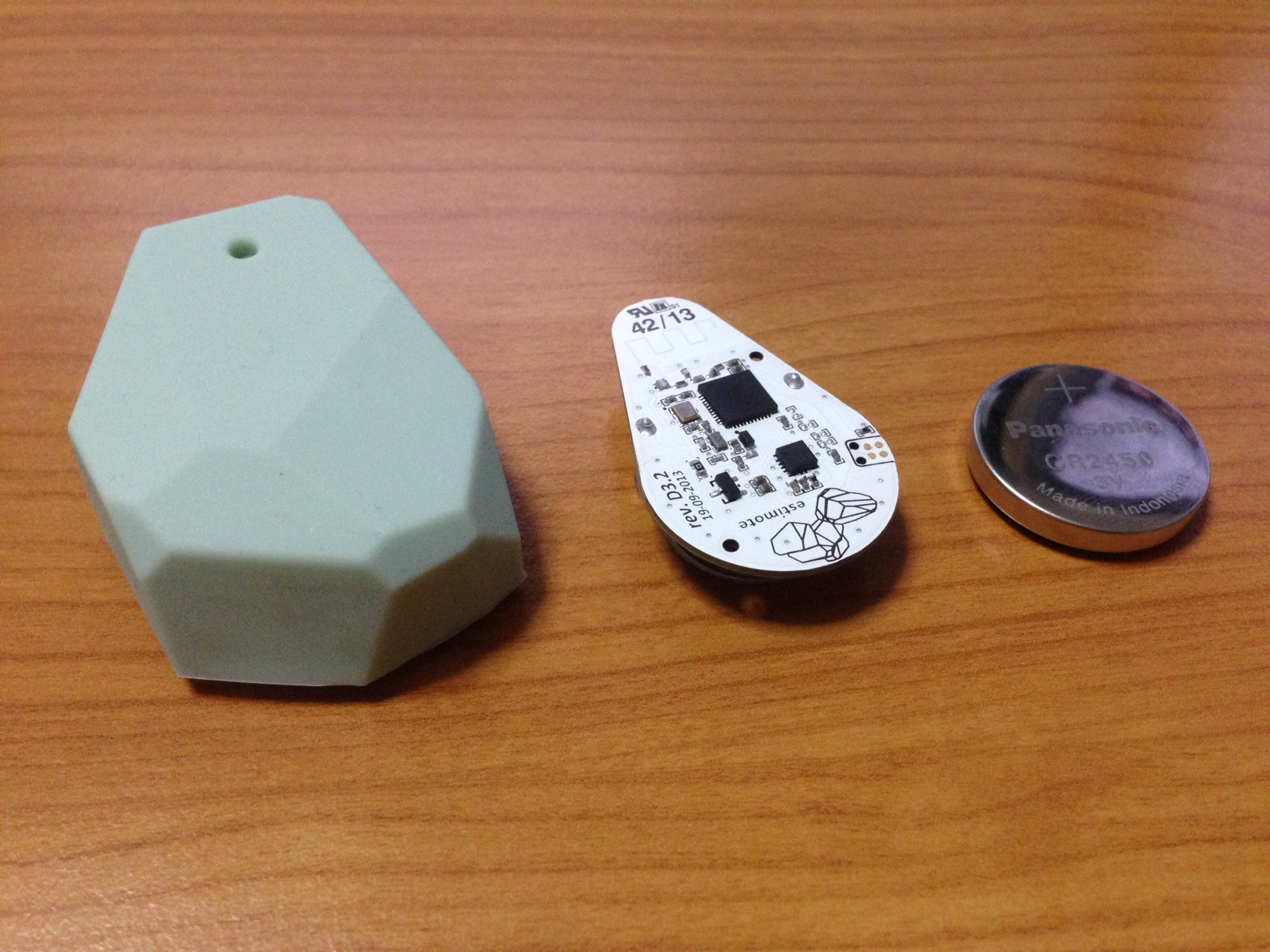 Figure 3: The Estimote iBeacon and its innards, with the battery removed.